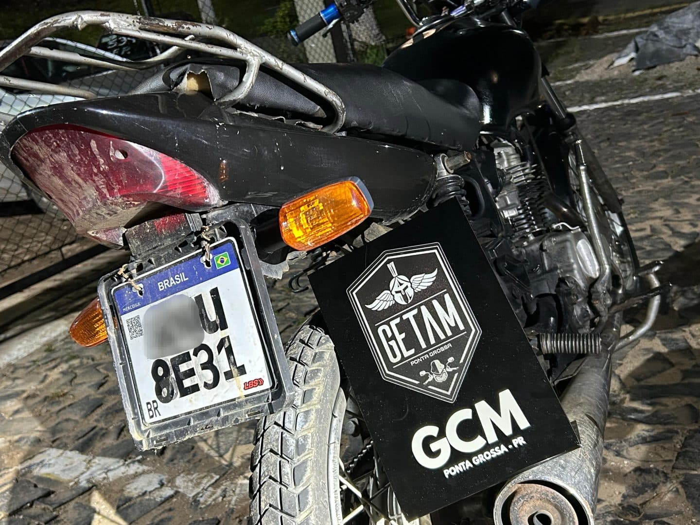 Placa adulterada PG