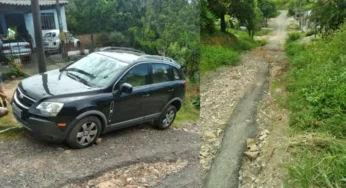 Carro fica preso em buraco na rua do Nova Rússia