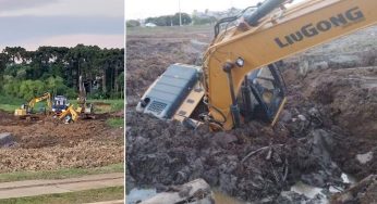Trator é engolido por poço de lama durante obras no Lago de Olarias